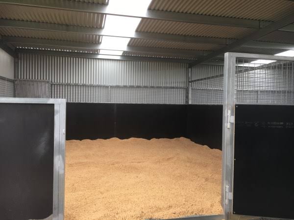 Interior of sand-bedded stable boxes at Carberry Racing